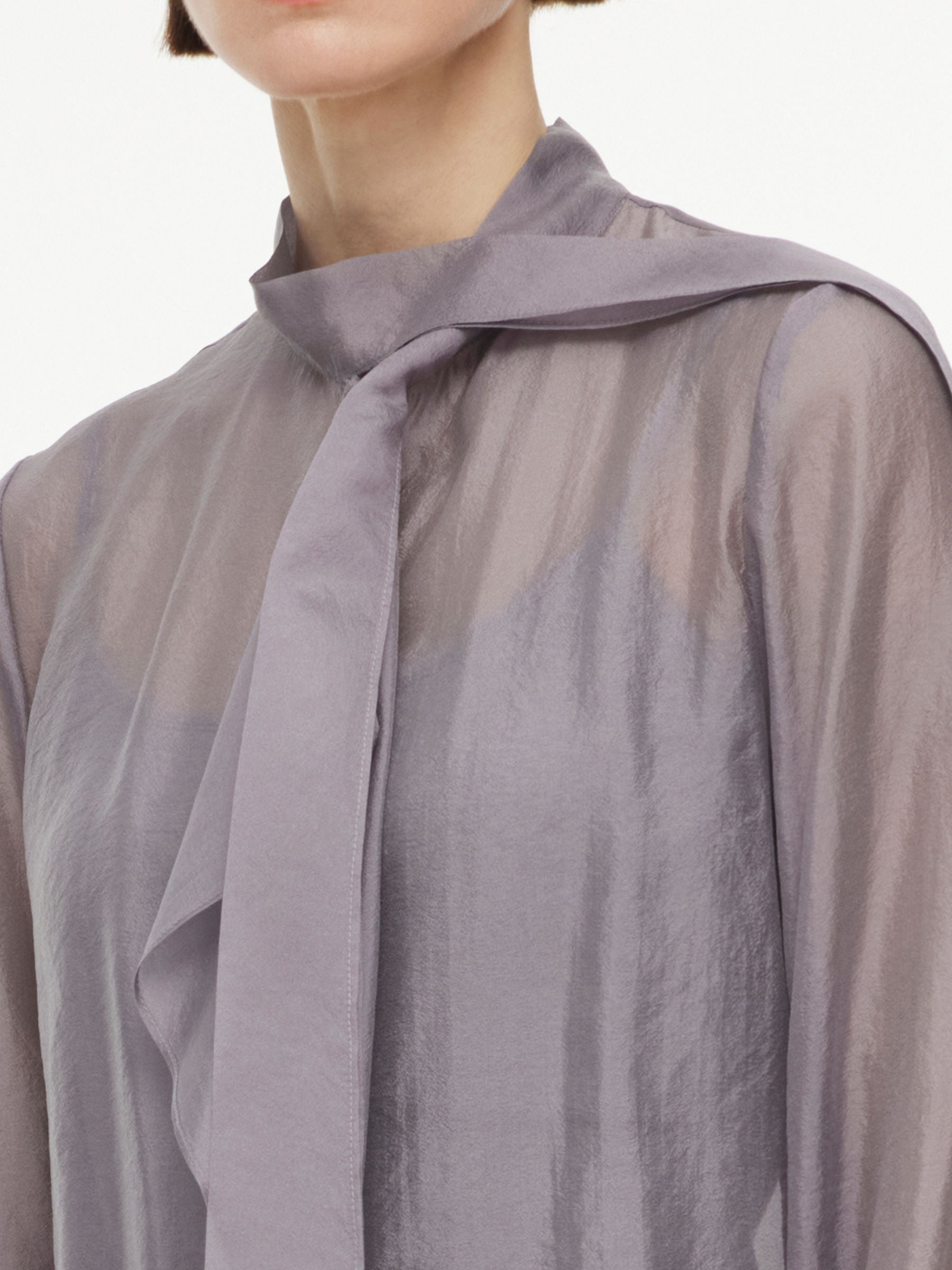 Asymmetrical Ruffle Tie-Neck